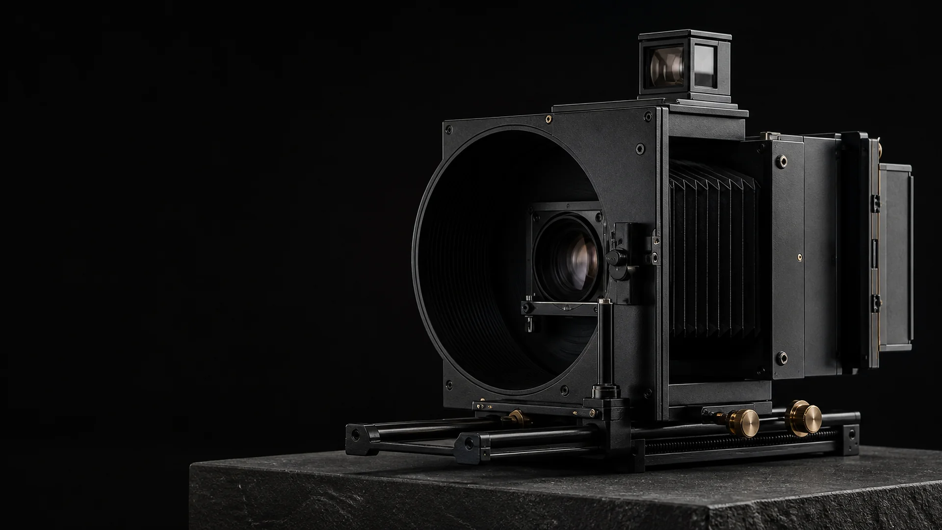 OBSCURA, a black optical instrument with brass controls and precision rails